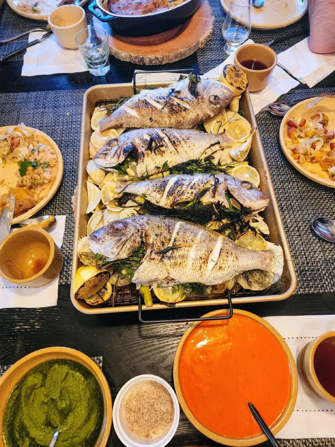 Whole roasted sea bream with herbs and garlic